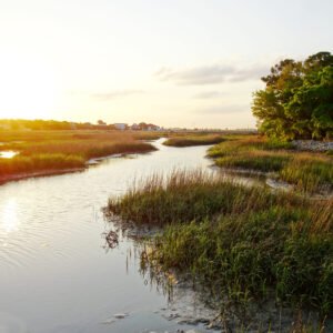 View of coastal homes along the marsh waterways in the Low Country near Charleston SC at sunset